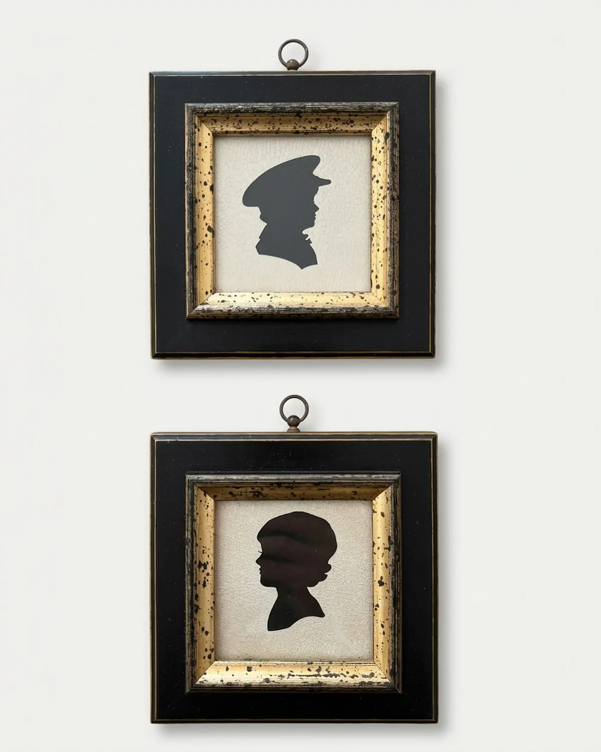Two small framed paper silhouette portraits in black and gilt frames
